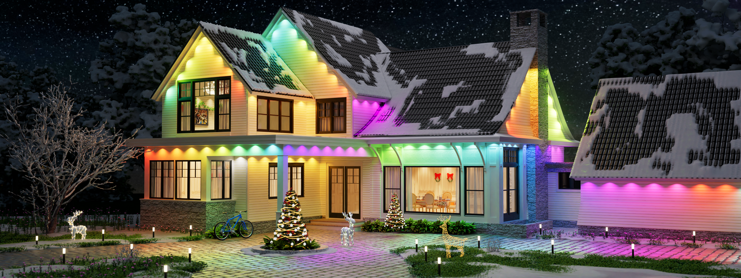 DeckTok permanent outdoor lights in Christmas lighting mode with colorful illumination on a snow-covered house