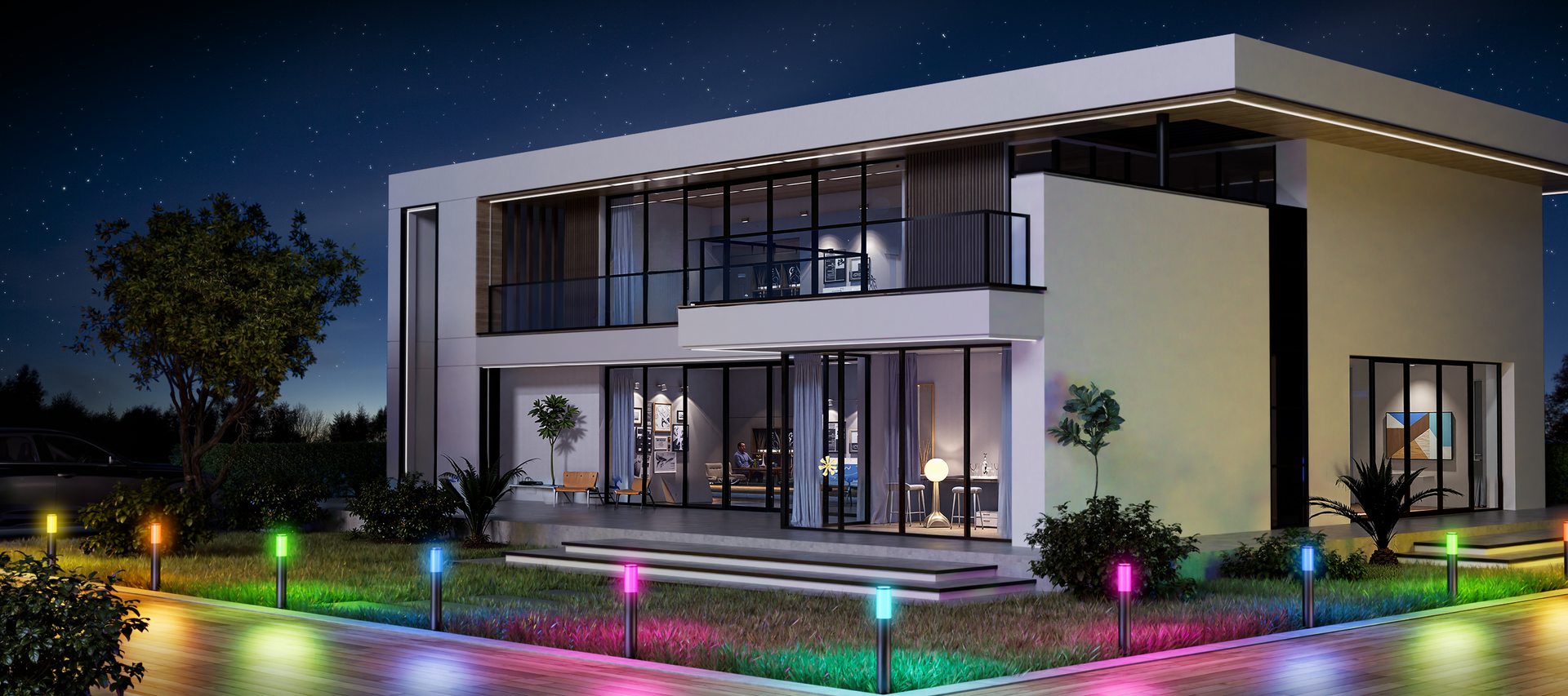 Smart pathway lights illuminating modern home landscape with multicolor lighting